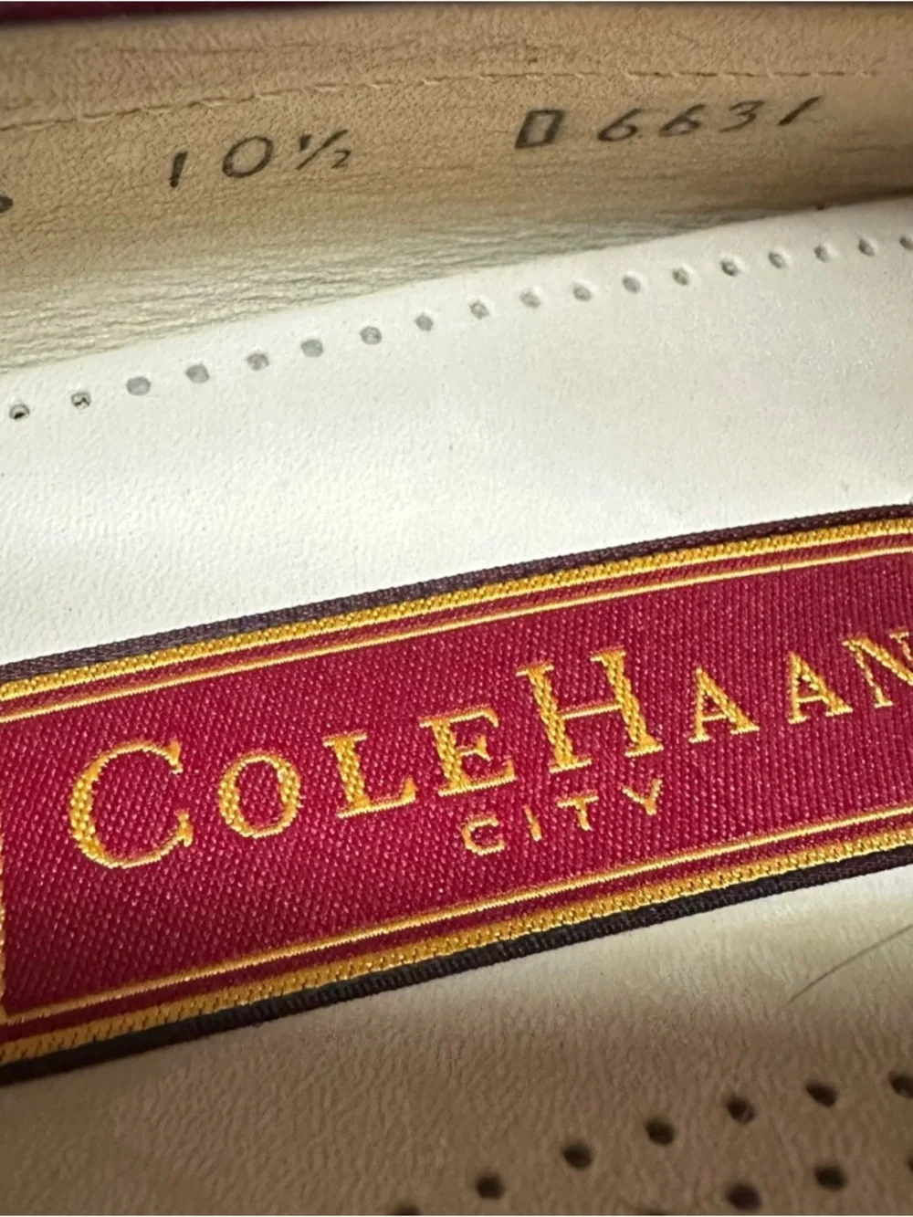 Cole Haan Pinch Buckle Kiltie Loafer (Style 03516) in a burgundy leather finish